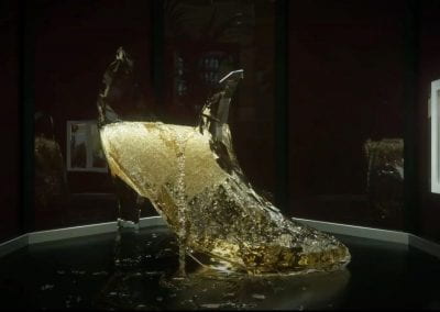 Animation of a glass slipper filled with a golden liquid