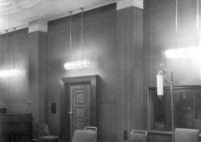 Old black and white photographed of a room designed in Art Deco style.