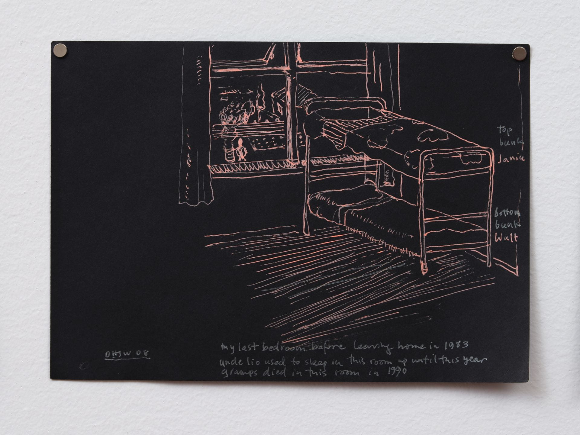 A small drawing using golden ink on black paper. The drawing depicts a bedroom with bunk beds and a window.